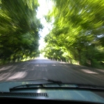 Young Azerbejan men drive rickety Ladas fast.