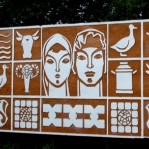 Welcome sign at collective farm.