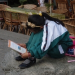 School Girl Stopping For A Read       