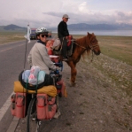 Uyghur boy and his fast pony.