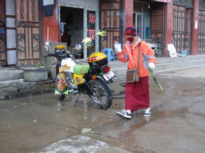 A Monk Detailing His Motorcycle