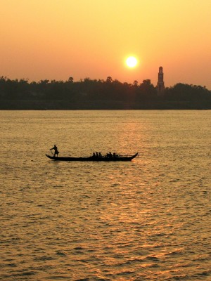 Boat on Mekong at Sunset